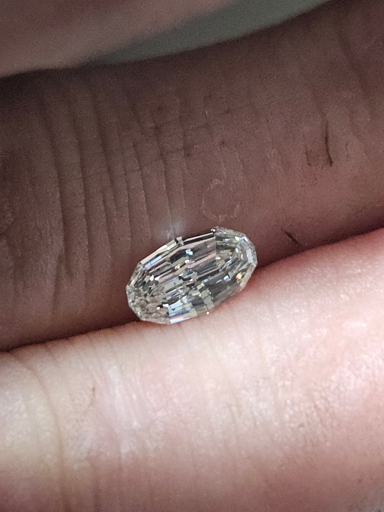 GIA 0.90 CT Modified Oval Step Cut G SI2 EX VG