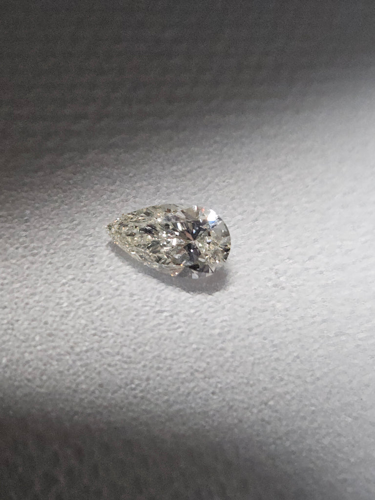 GIA 0.70 CT Natural Pear Brilliant K SI2 EX VG