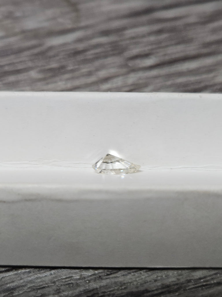 GIA 0.70 CT Natural Pear Brilliant K VS1 XX