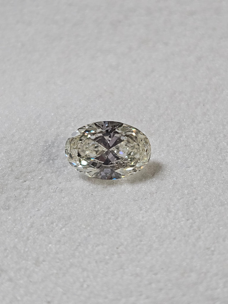 GIA 0.70 CT Natural Oval Brilliant K SI2 EX EX Strong Blue