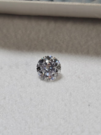 0.49 CT Natural Round Brilliant Blue Tint I1