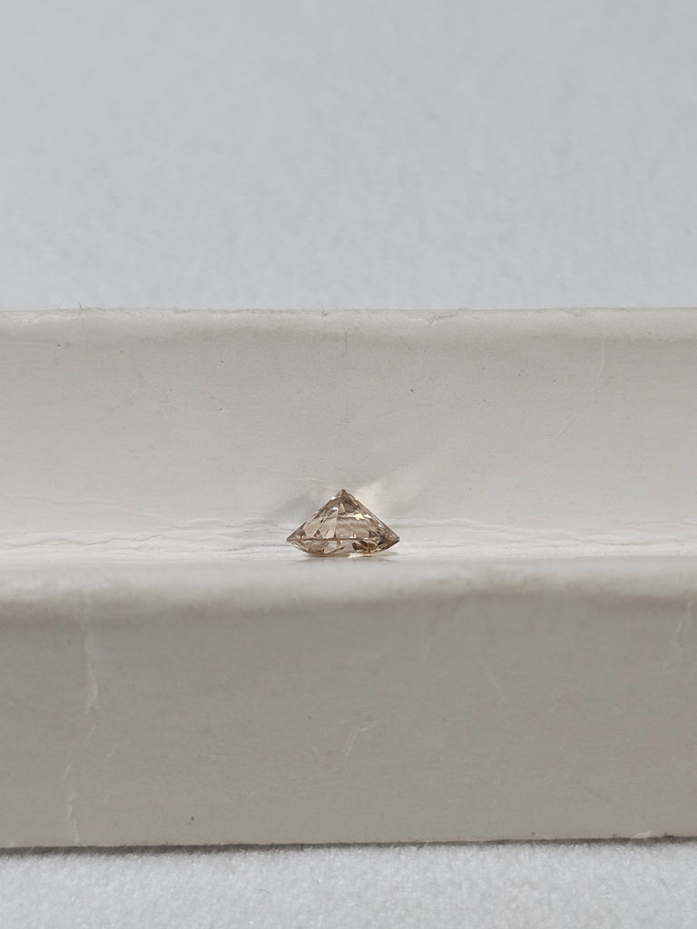 0.58 CT Natural Round Brilliant Brown I1