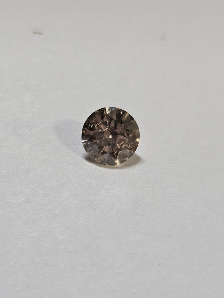 0.58 CT Natural Round Brilliant Brown I1