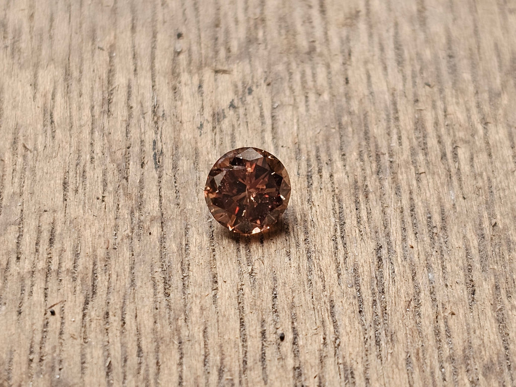 0.68 CT Natural Round Brilliant Cool-Brown I2