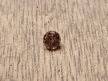 0.68 CT Natural Round Brilliant Cool-Brown I2