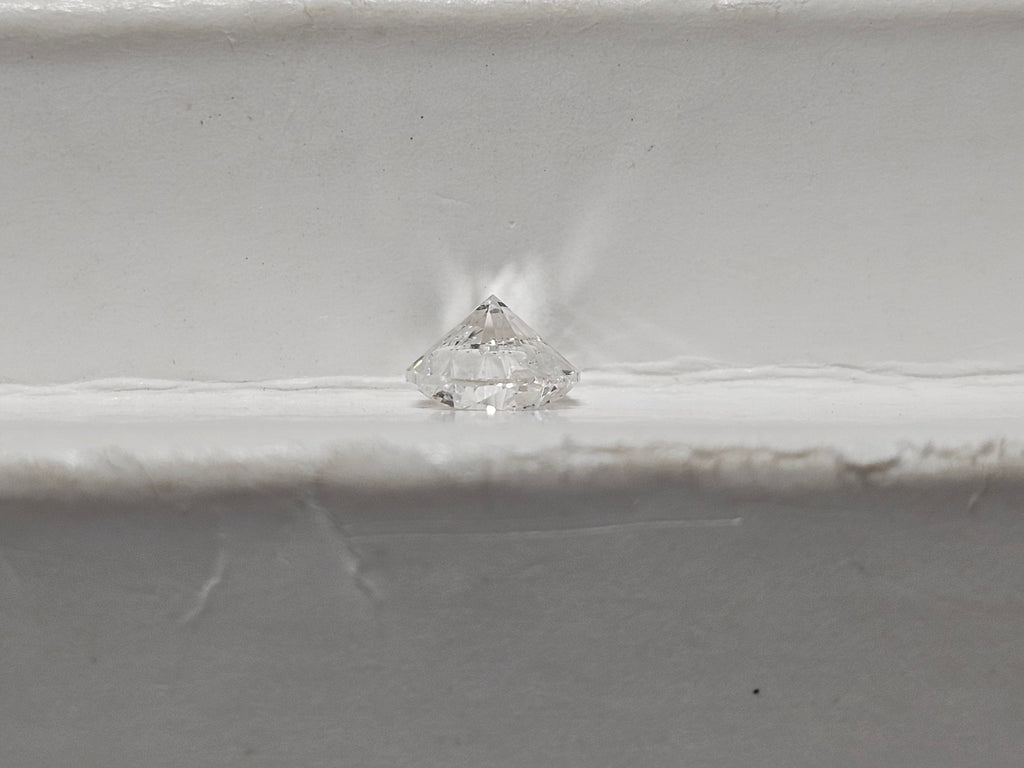 0.61 CT Natural Round Brilliant GH I2