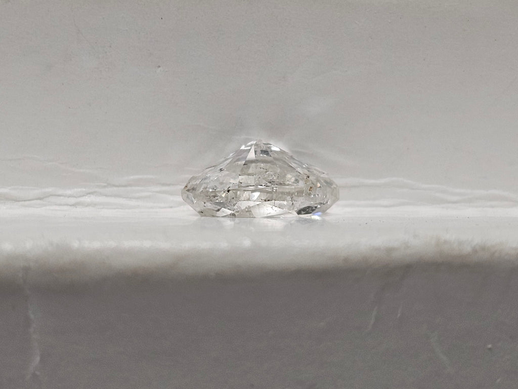 0.99 CT Natural Oval Cut GH I2