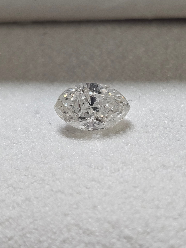 0.99 CT Natural Oval Cut GH I2
