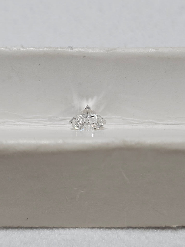 0.70 CT Natural Round Brilliant FG I2