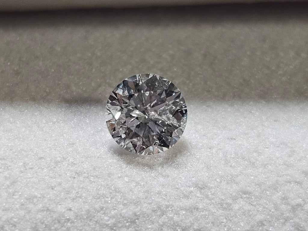 0.70 CT Natural Round Brilliant FG I2