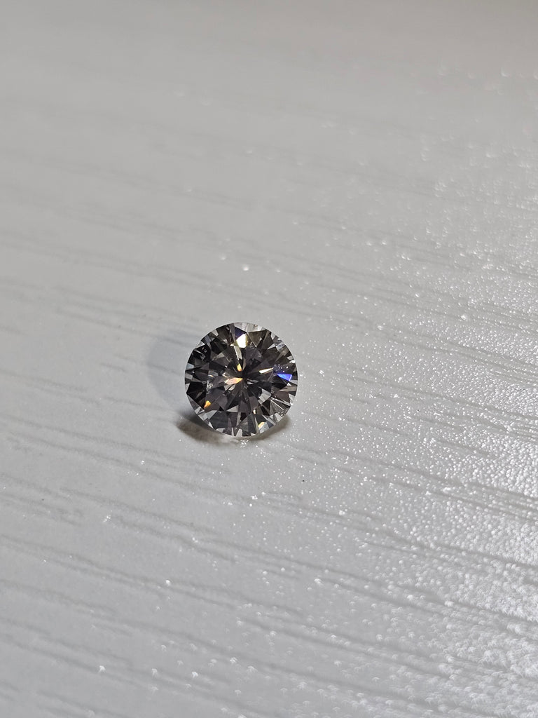 0.69 CT Natural Round Brilliant GH SI2