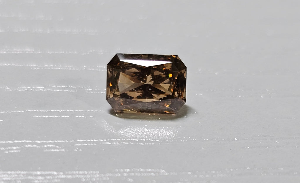 1.02 CT Natural Yellowish Brown Radiant Cut SI2