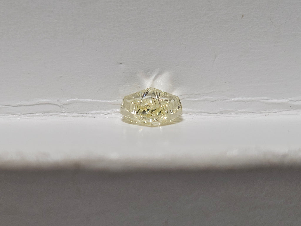 0.49 CT Natural Fancy Like Yellow Heart Cut SI1