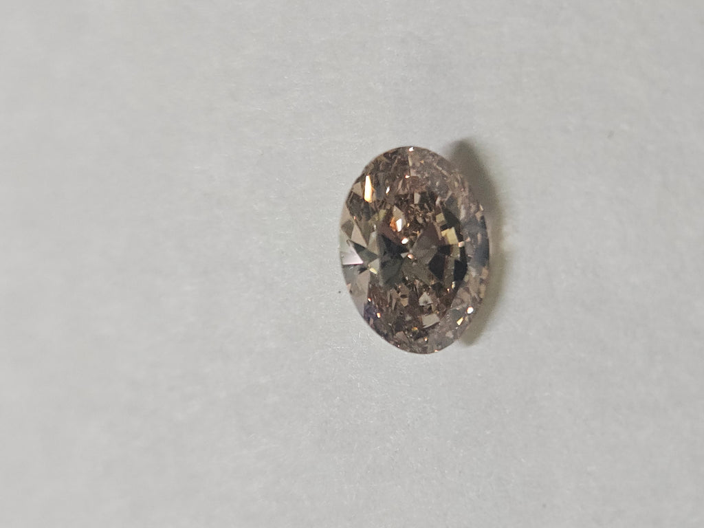 0.99 CT Natural Oval Fancy Light Brown SI1
