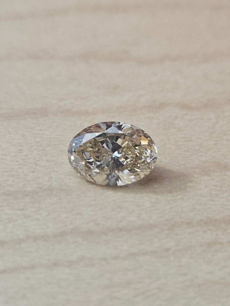 1.02 CT Natural Oval Brilliant Light Brown SI2
