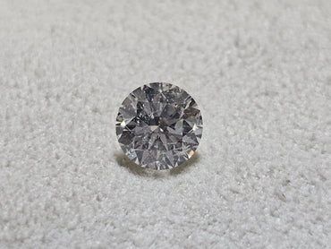 HRD 1.29 CT Natural Round Brilliant G I1 XXX