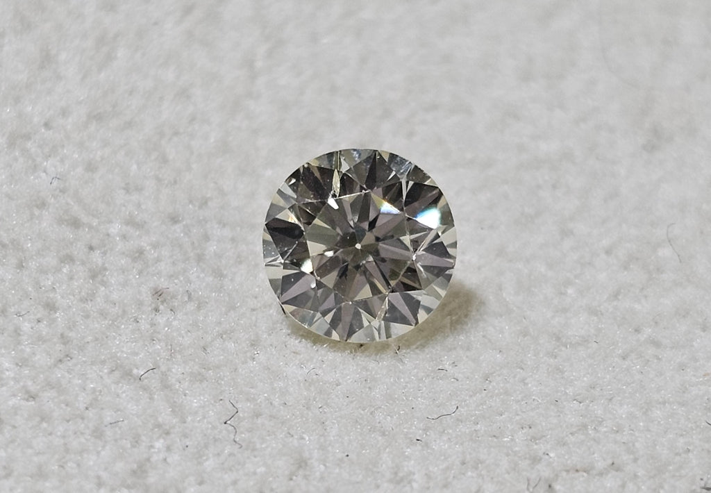 0.56 CT Natural Round Brilliant M SI1-SI2