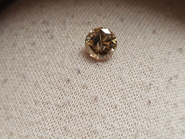 1.42 CT Natural Brown Round Imperfect