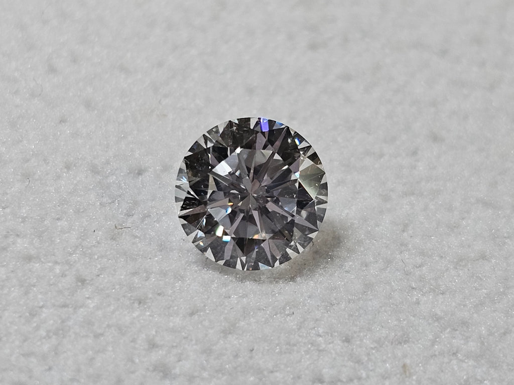 1.07 CT Natural Round Brilliant Cut EF SI1-VS