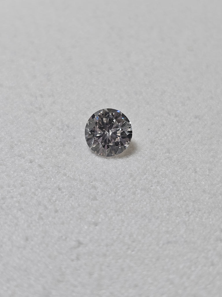 0.76 CT Round Diamond HI I1