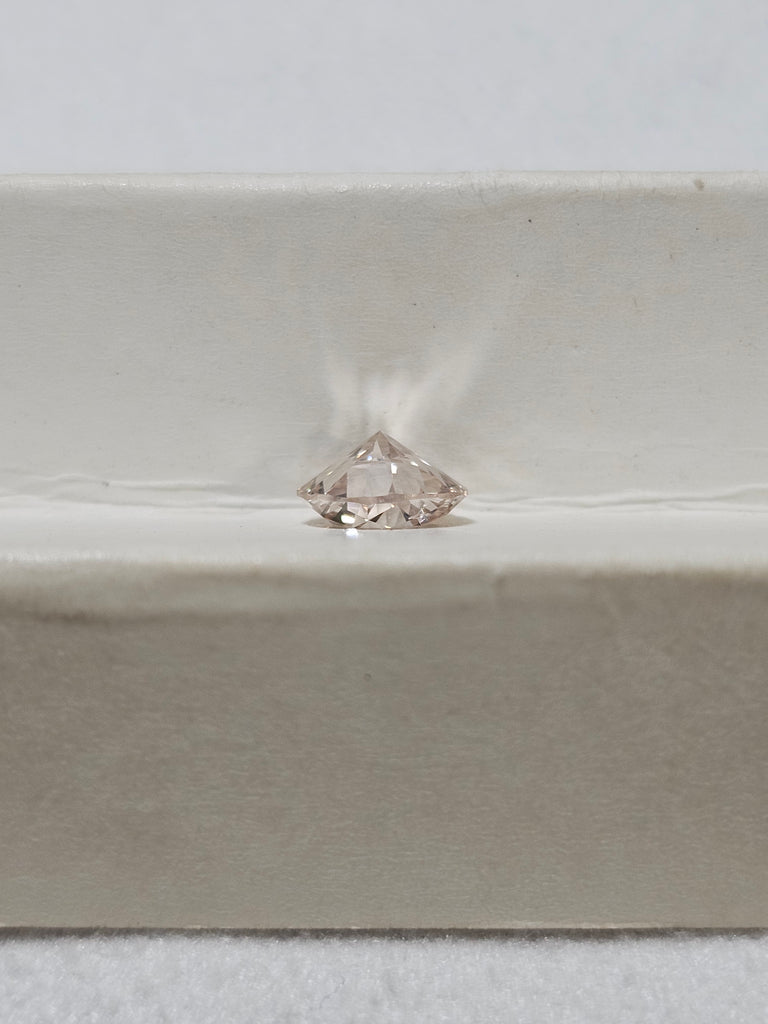 0.76 CT Round Diamond K-Faint Brown SI2