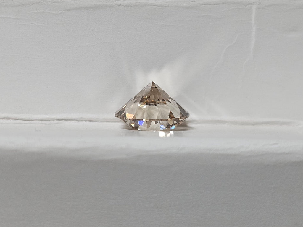 GIA 1.29 CT Natural Round Brilliant Light Brown S-T VS2 XXX