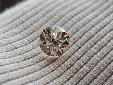 GIA 1.29 CT Natural Round Brilliant Light Brown S-T VS2 XXX