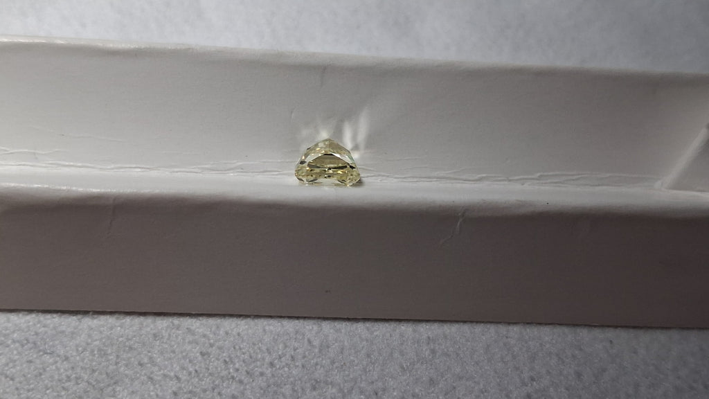 10.49g 18k Gold/ 1.55 CT Natural Fancy Yellow SI2 Center