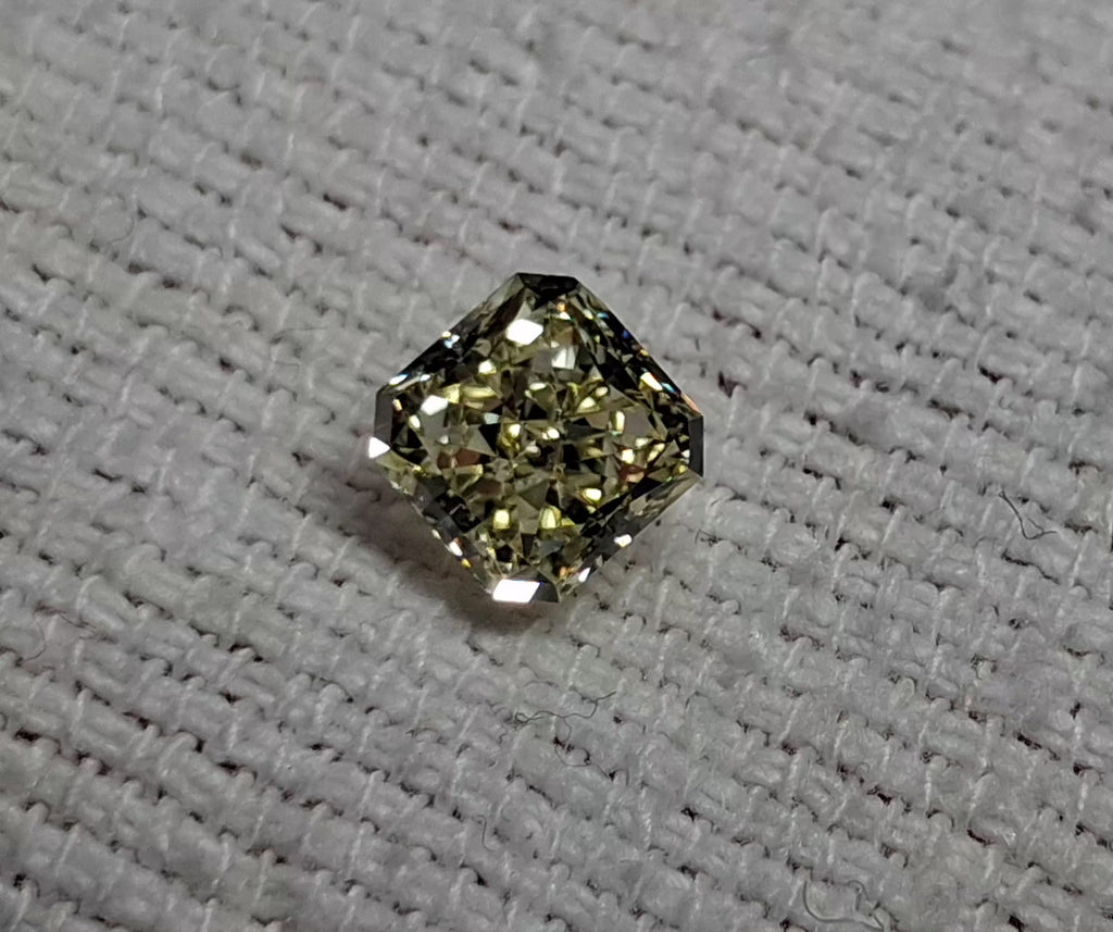 10.49g 18k Gold/ 1.55 CT Natural Fancy Yellow SI2 Center