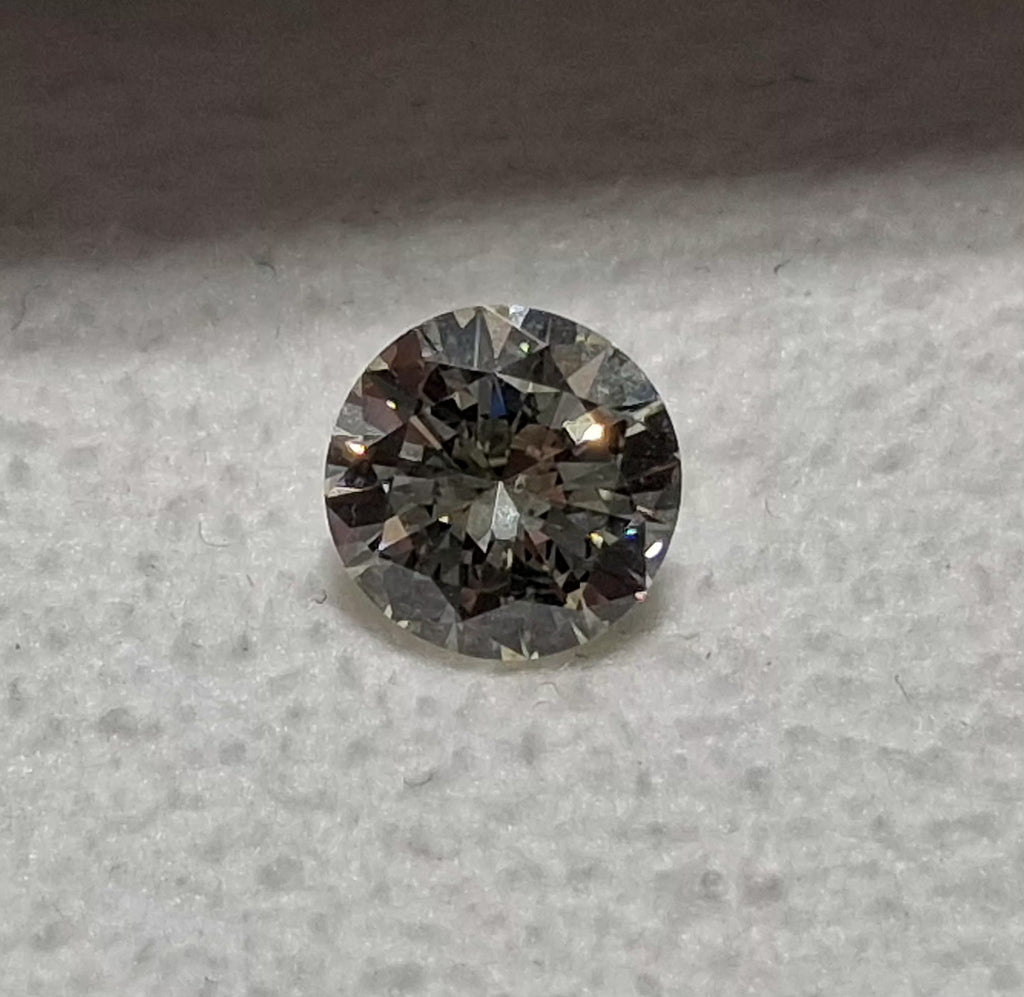 0.58 CT Natural Round Brilliant LM SI1