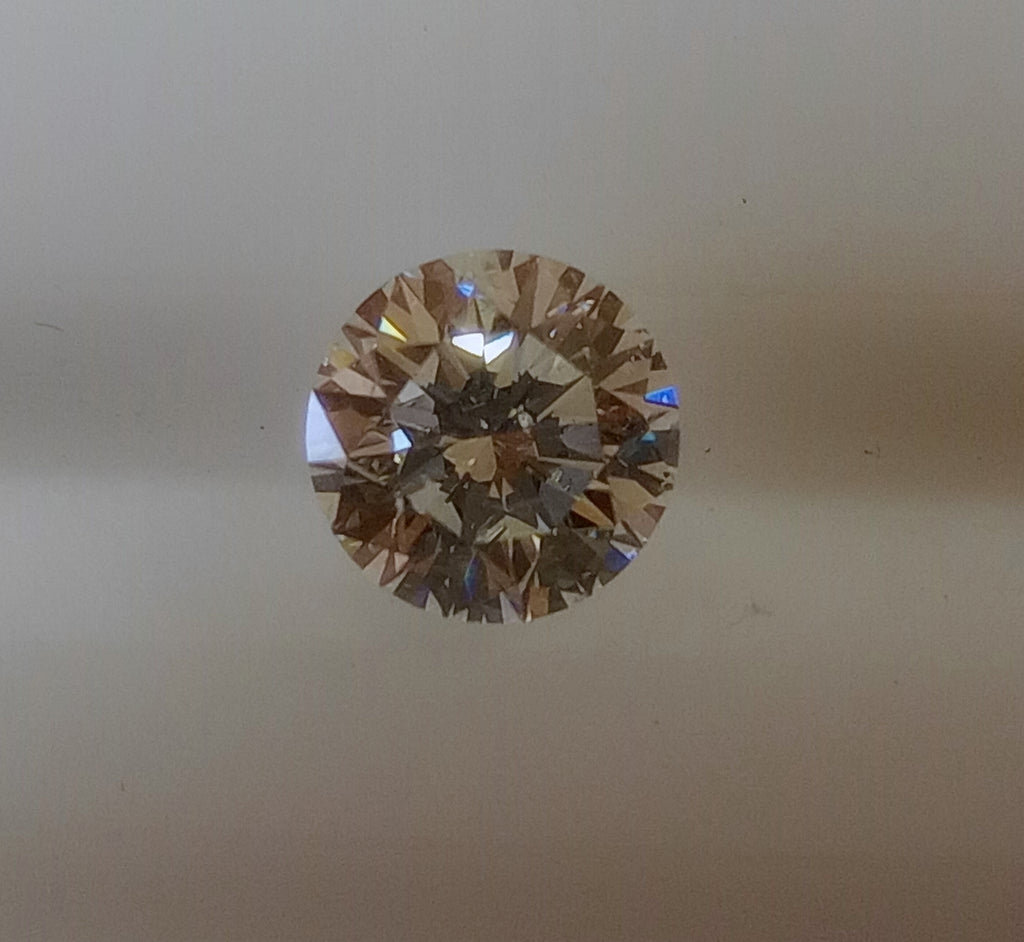 GIA 1.56 Round Brilliant Natural Diamond, K, I1 -55