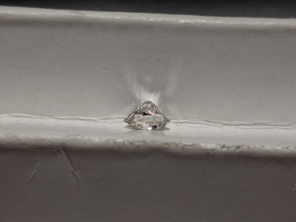 0.64 CT Natural Old european Cut G-H SI2