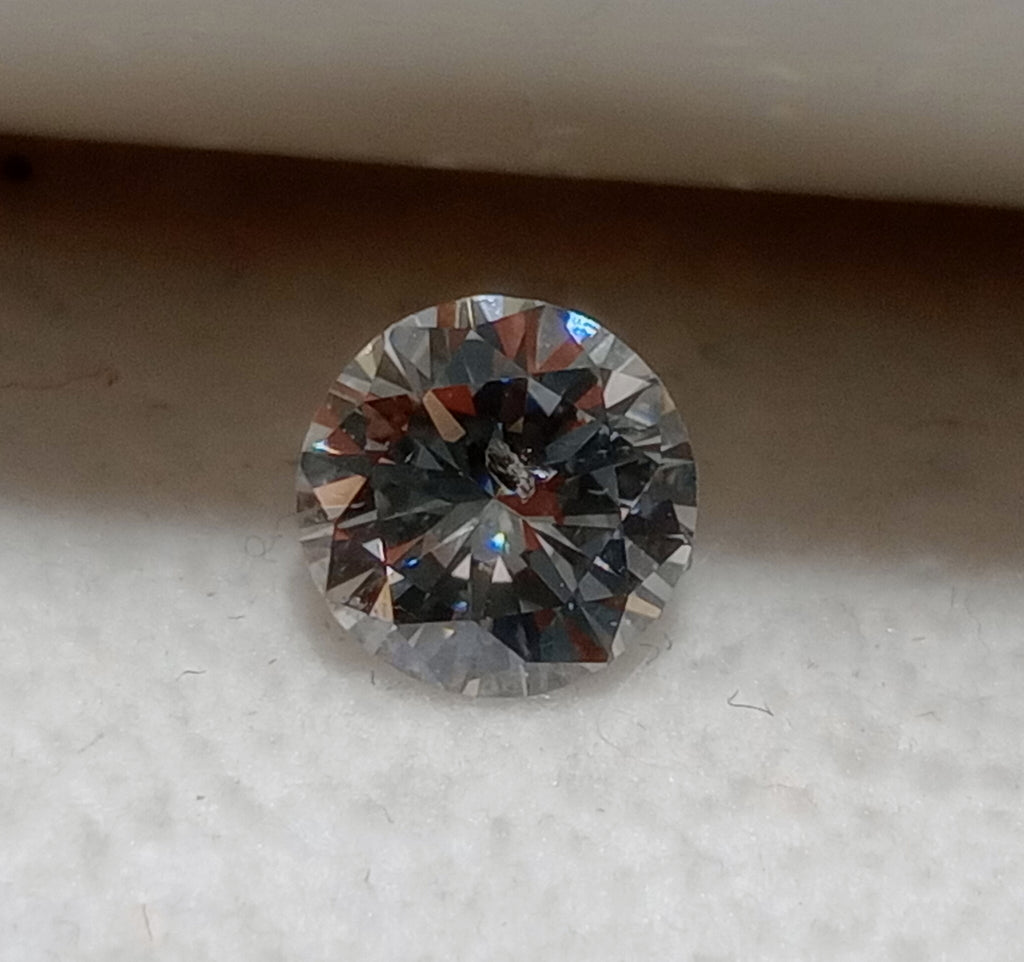 0.64 CT Round Brilliant Natural Diamond H-I I2