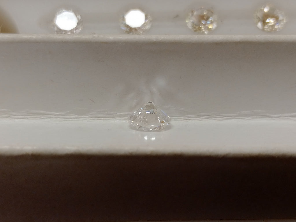 0.98 CT Natural Round Brilliant E-F I2 Open Culet