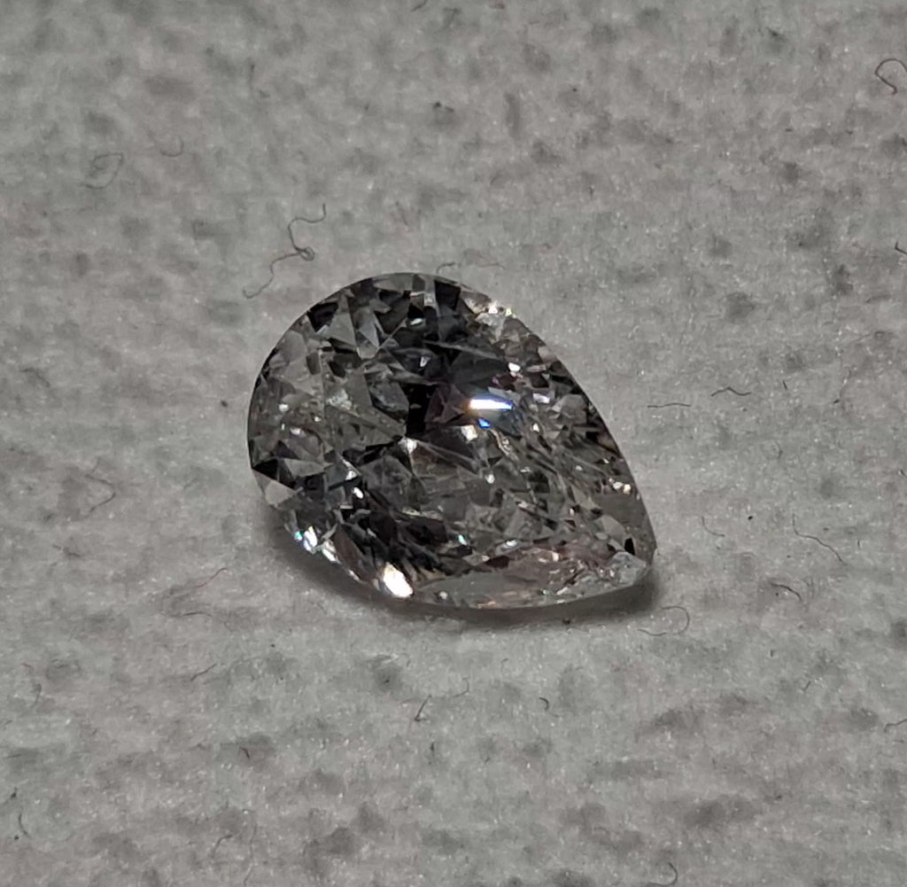 0.99 CT Natural Pear Cut Broken FG I1