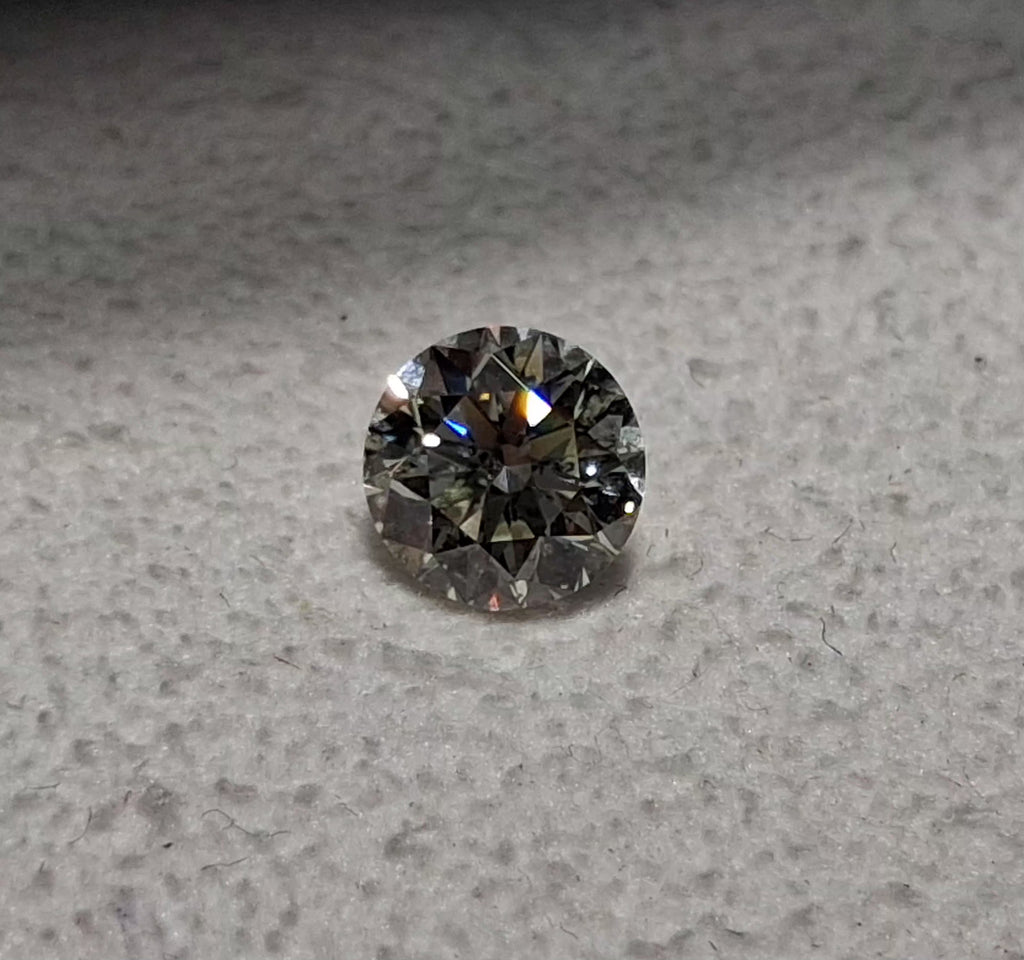 0.71 CT Natural Round Brilliant K-L I1