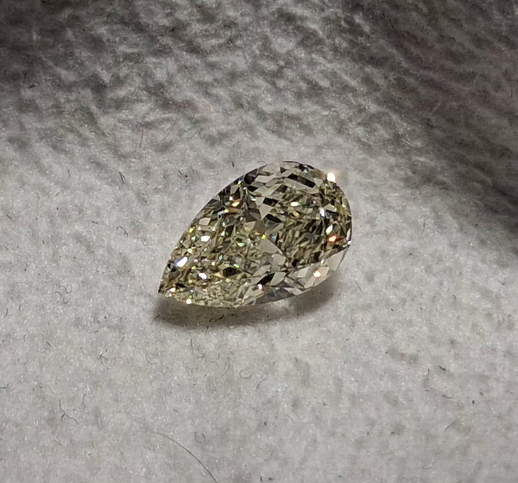 GIA 0.70 CT Natural Pear Modified Brilliant U-V VS1 EX VG