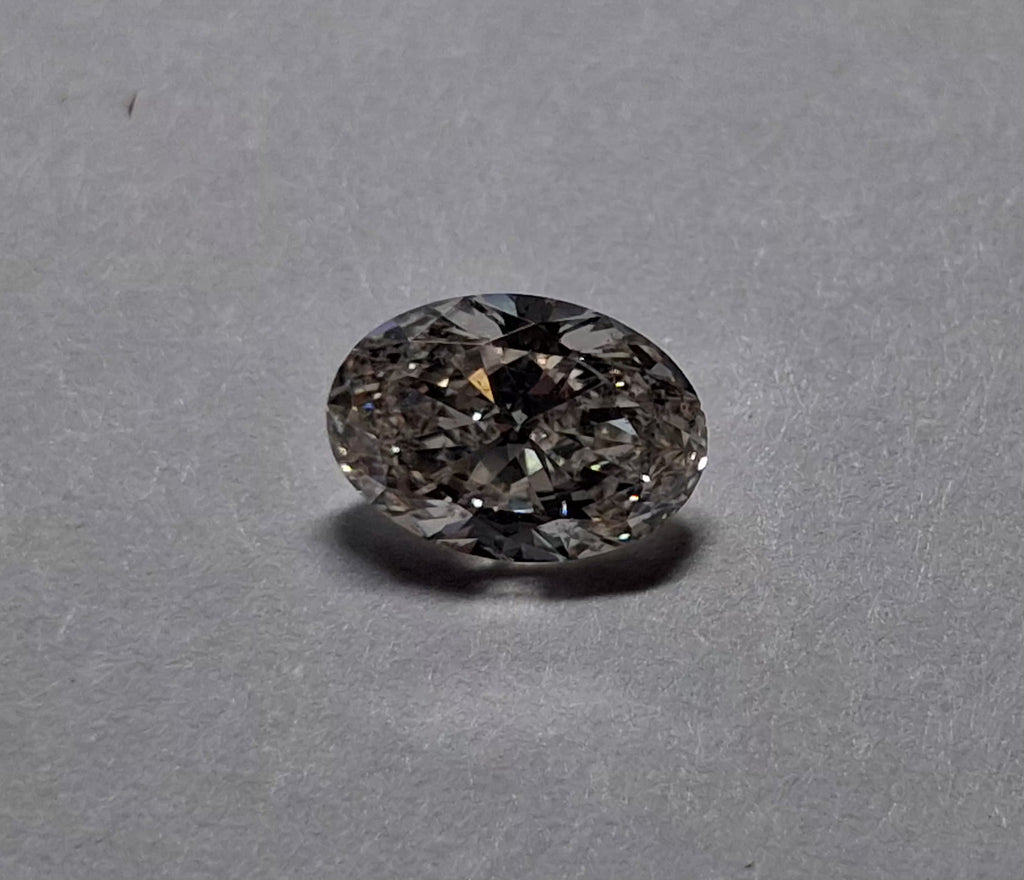 GIA 1.01 CT Natural Oval Brilliant K Faint Brown SI2 XX