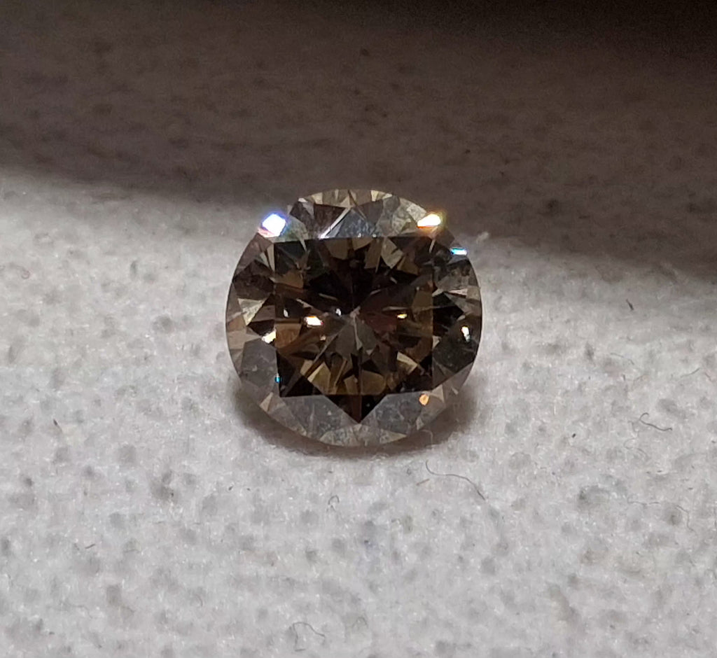 0.93 CT Natural Brown Round Brilliant I1 Small chip on culet