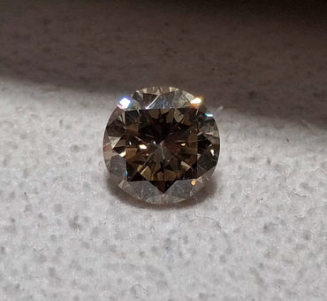 0.93 CT Natural Brown Round Brilliant I1 Small chip on culet