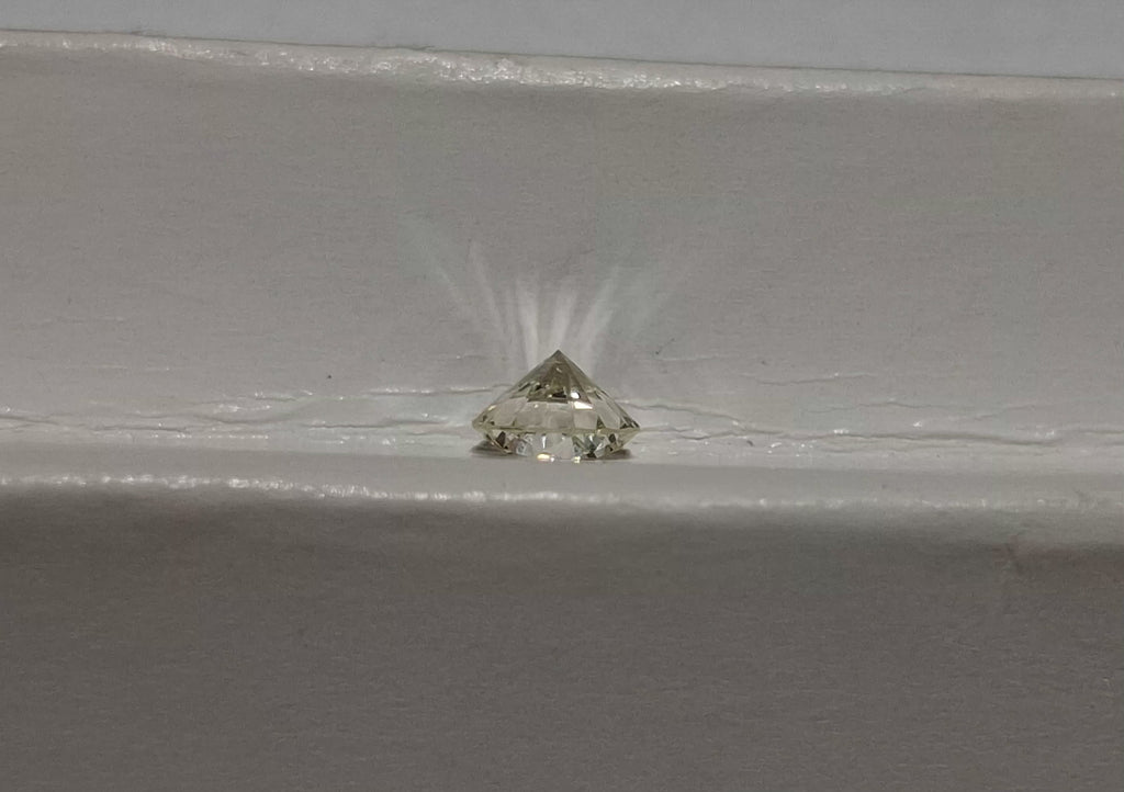 GIA 0.56 CT Natural Round M VVS1