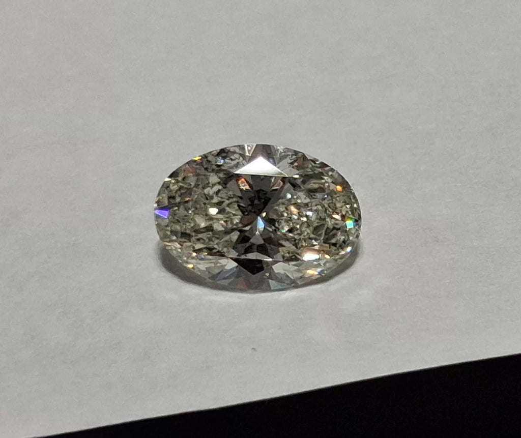 IGI 1.21 CT Natural Oval Brilliant J SI2 XXX