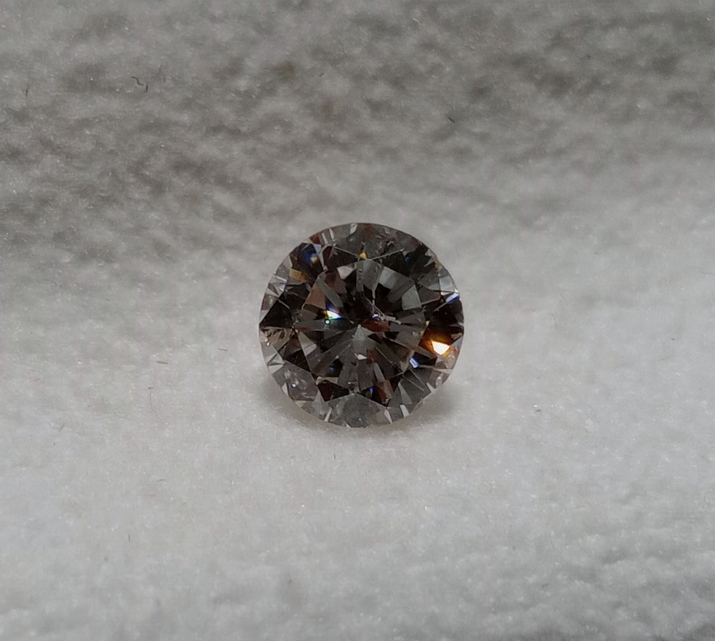0.57 CT Round Brilliant Natural Diamond J-K I1