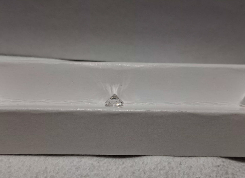 0.63 CT Natural Round Brilliant Cut FG I1