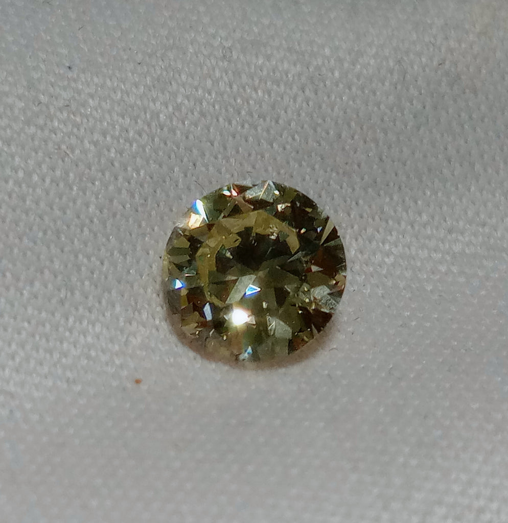 0.59 CT Round Brilliant Natural Diamond M-N VS
