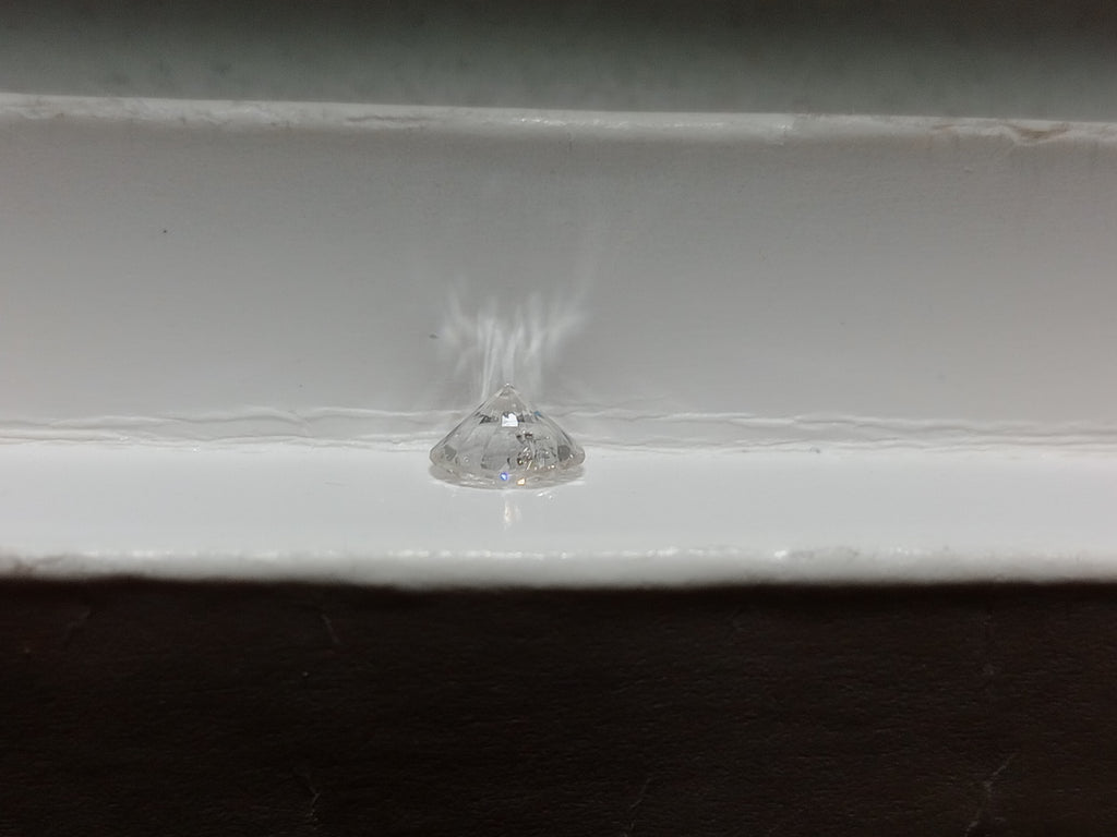 0.64 CT Round Brilliant Natural Diamond H-I I2