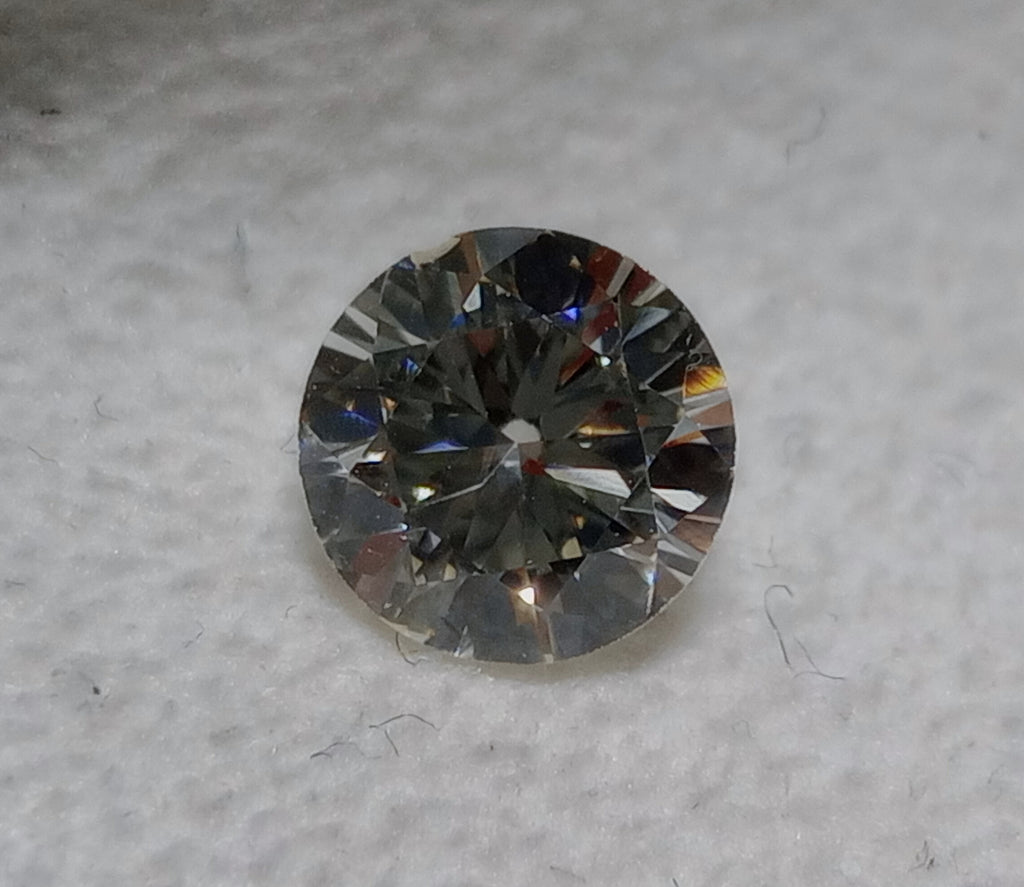 1.04 CT Round Brilliant Natural Diamond K-L SI1 Chipped
