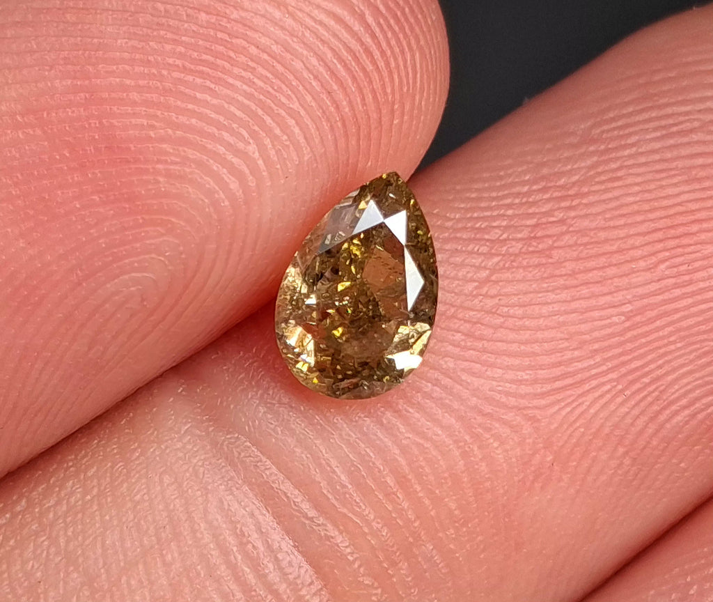 1.00 CT Natural Imperfect Pear yellow-greenish brown