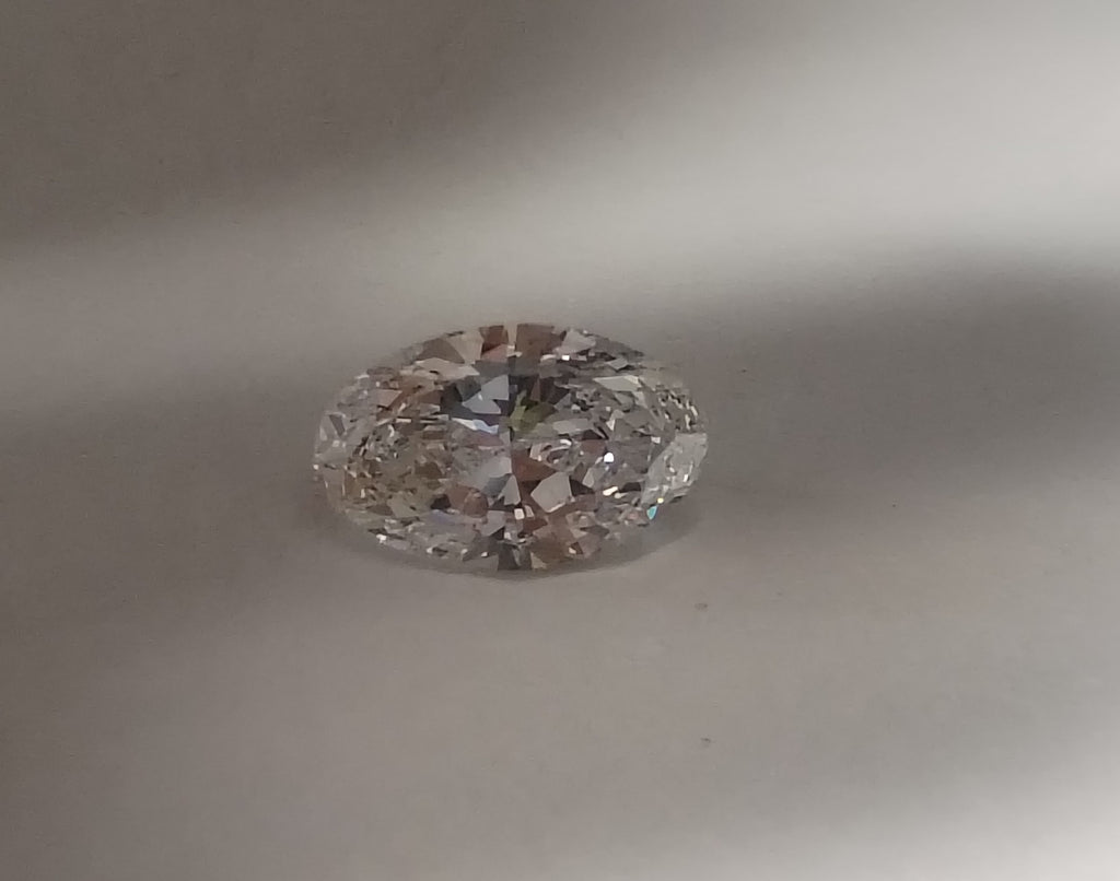 0.91 CT GIA Oval Shaped Natural Diamond E VVS1 Color Treated