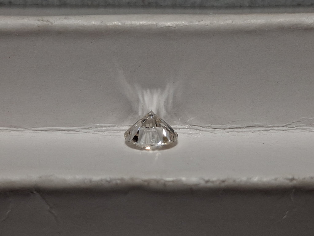 0.77 CT Natural Round Cut IJ Light Undertone I1